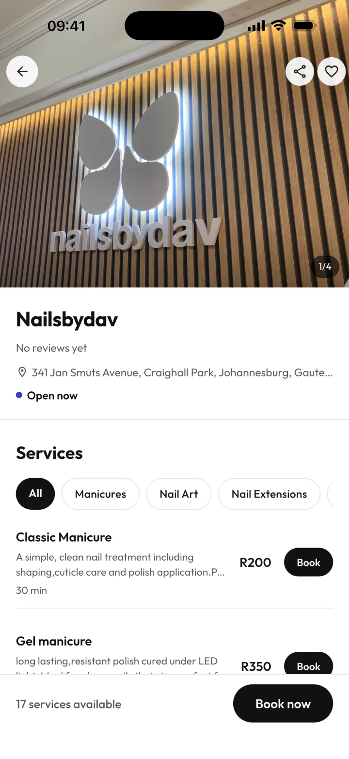 A salon profile in CutQ with its address, service categories and priced services to book