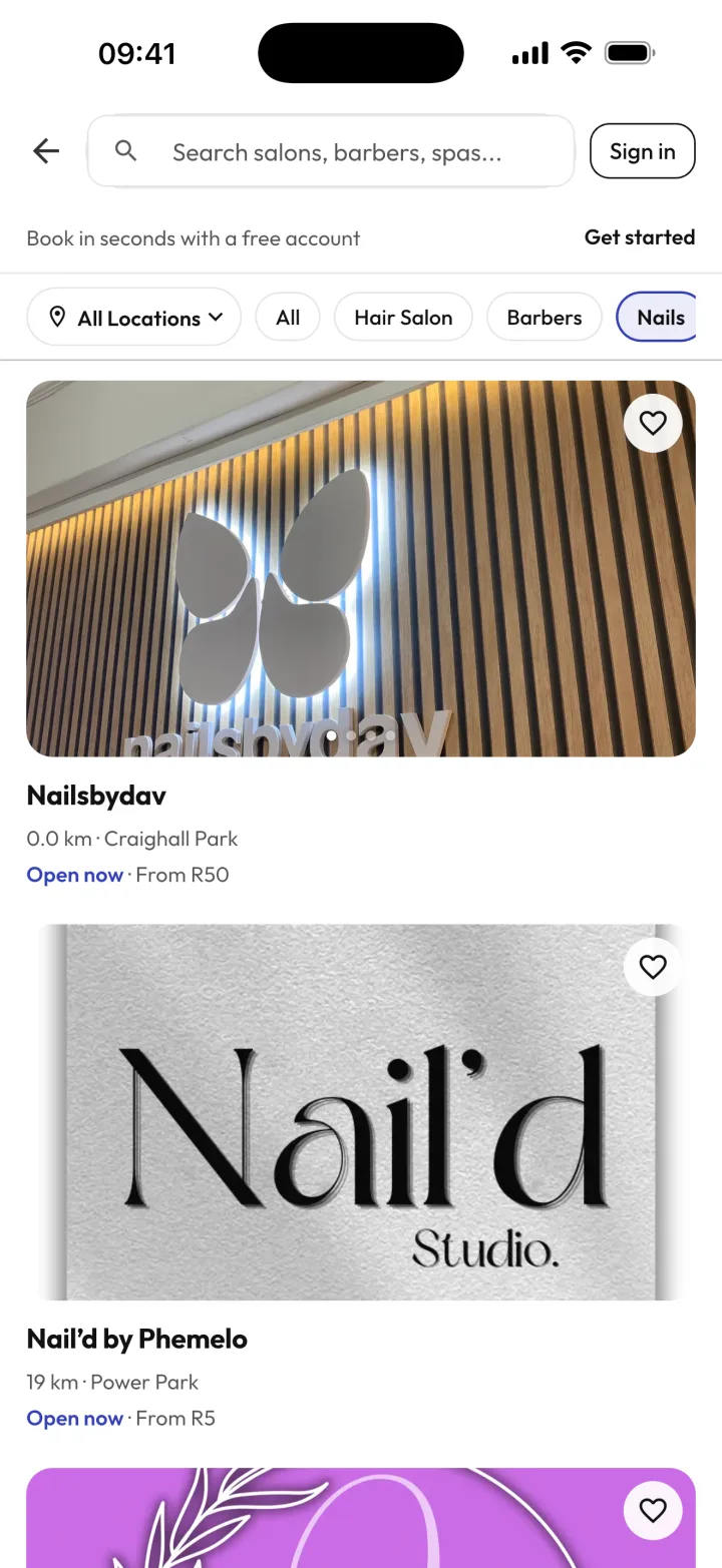 CutQ search results with location and category filters above a list of nearby businesses